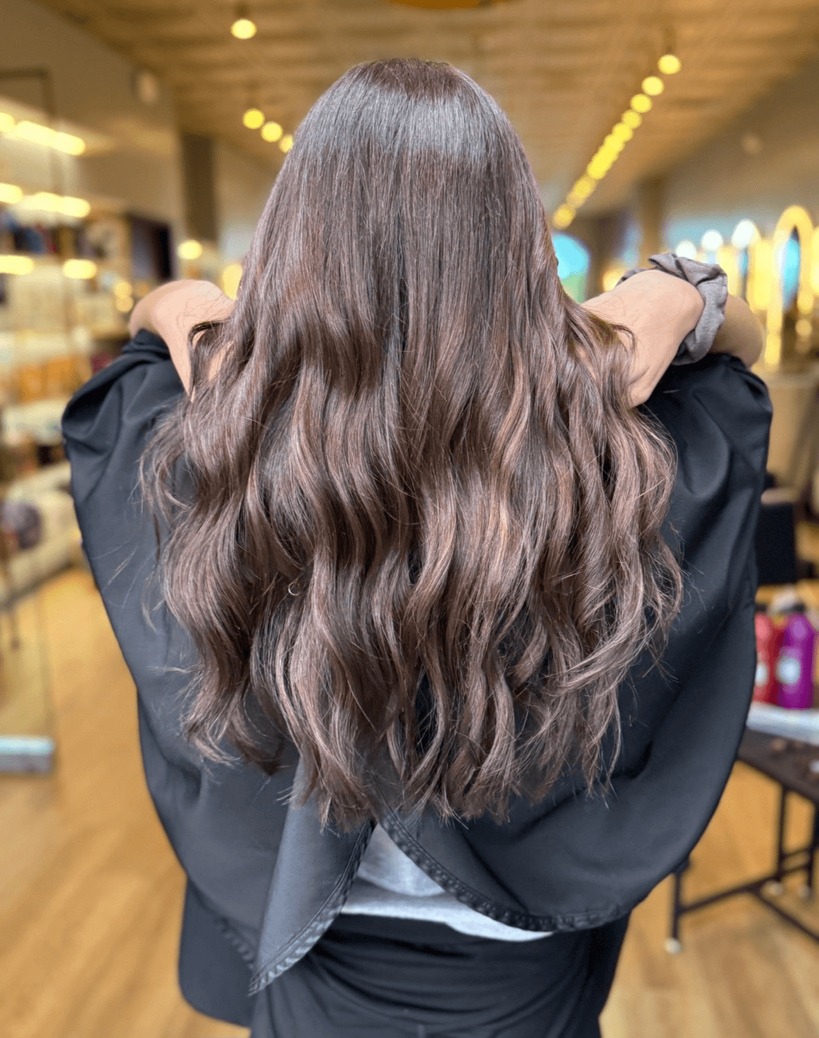 Long glossy brunette waves after a gloss treatment, by Karianna